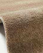 Liso Tan solid hand-tufted wool rug, view 3