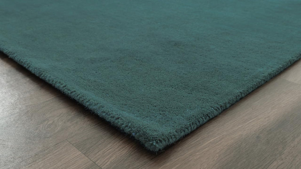 Liso Teal solid hand-tufted wool rug, view 1