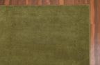 Liso Olive solid hand-tufted wool rug, view 1
