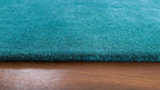Liso Turquoise solid hand-tufted wool rug, view 4