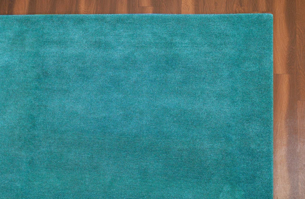 Liso Turquoise solid hand-tufted wool rug, view 1