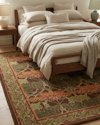 Cesil Floral Wool Rug in Green under a bed