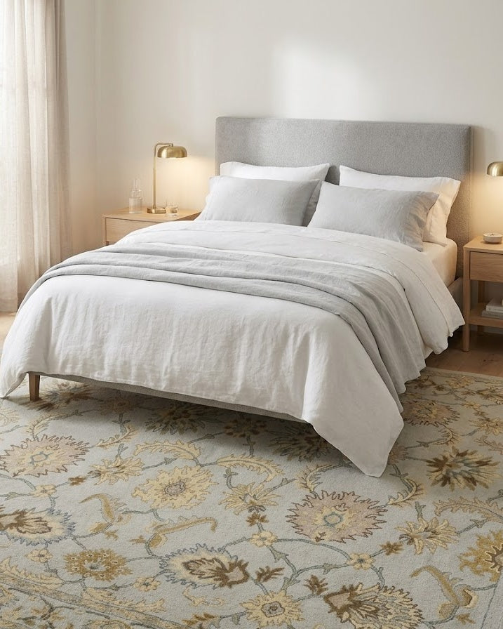 Gabriel Floral Wool Rug in Gray under a bed
