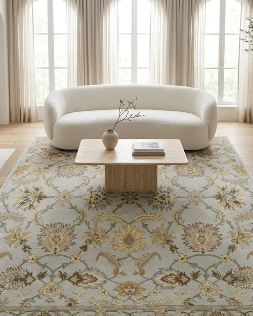Gabriel Floral Wool Rug in Gray in an airy living room