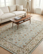 Malicka Persian-style wool rug in a bright living room